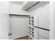 Walk-in closet features custom shelving and racks to provide ample storage space at 2633 S El Dorado Dr, Mesa, AZ 85202