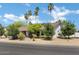 Charming single-story home with mature trees and desert landscaping along a well-maintained street at 2633 S El Dorado Dr, Mesa, AZ 85202