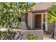 Inviting front entrance with a beautiful wooden door and textured columns at 2633 S El Dorado Dr, Mesa, AZ 85202