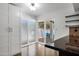 Bright kitchen nook with granite countertops, sliding doors, and access to the outdoor patio at 2633 S El Dorado Dr, Mesa, AZ 85202