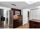 Modern kitchen featuring stainless steel appliances, granite countertops, and ample cabinet space at 2633 S El Dorado Dr, Mesa, AZ 85202