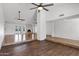 Spacious living room with tile floors, a fireplace, and access to the backyard at 2633 S El Dorado Dr, Mesa, AZ 85202