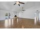 Bright living room with tile flooring, a fireplace, and glass doors to the backyard at 2633 S El Dorado Dr, Mesa, AZ 85202
