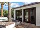 Wood frame double doors providing access to the backyard pool at 2633 S El Dorado Dr, Mesa, AZ 85202
