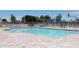 Beautiful community pool with clean tiled deck and blue umbrellas. Great for relaxation and recreation at 2633 S El Dorado Dr, Mesa, AZ 85202