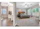 Spacious main bedroom with an en-suite bathroom and large windows at 26814 N 65Th Dr, Phoenix, AZ 85083