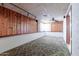 Bright basement with painted walls and carpeted floors, offering ample space for customization at 2926 W San Miguel Ave, Phoenix, AZ 85017