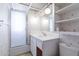 Bright bathroom features a shower-tub combination and a vanity sink at 2926 W San Miguel Ave, Phoenix, AZ 85017