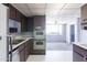 Kitchen with abundant cabinets and essential appliances, ready for a modern transformation at 2926 W San Miguel Ave, Phoenix, AZ 85017