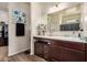 Functional bathroom featuring vanity, storage drawers, and a mirror, maximizing the space and organization at 30238 N Ocotillo Dr, Florence, AZ 85132