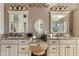 Luxurious bathroom with double sinks, granite countertops, and a vanity area at 3295 S Ambrosia Dr, Chandler, AZ 85248