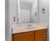 Well lit bathroom featuring a single sink vanity and a large mirror at 3416 W Julie Dr # 4, Phoenix, AZ 85027