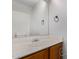 Bathroom with a single sink vanity and a bright vanity mirror at 3416 W Julie Dr # 4, Phoenix, AZ 85027