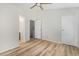 Bedroom featuring wood-look flooring and easy access to the bathroom and other rooms at 3416 W Julie Dr # 4, Phoenix, AZ 85027