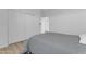 Bedroom featuring closet, double doors, and hard surface floors at 3535 W Morgan Ln, San Tan Valley, AZ 85144