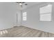 Bedroom featuring hard surface floors, white walls, and natural light at 3535 W Morgan Ln, San Tan Valley, AZ 85144