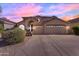 Beautiful two-story home with a spacious three-car garage and desert landscaping at 3535 W Morgan Ln, San Tan Valley, AZ 85144