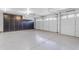 Spacious garage is clean, bright and includes large cabinets on the wall at 3535 W Morgan Ln, San Tan Valley, AZ 85144