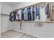 Walk-in closet with clothing hung on rods and wood-look flooring at 3535 W Morgan Ln, San Tan Valley, AZ 85144