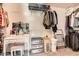 Organized walk-in closet with shelving, storage bins, and a vanity area at 3555 E Morenci Rd, San Tan Valley, AZ 85143