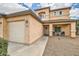 Charming home with a quaint front porch, desert landscape, and attached garage at 3555 E Morenci Rd, San Tan Valley, AZ 85143