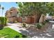 Charming townhome exterior with landscaped front yard and private balcony at 3600 N Hayden Rd # 3002, Scottsdale, AZ 85251