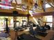 Community gym with treadmills and various exercise machines with large windows providing natural light at 3600 N Hayden Rd # 3002, Scottsdale, AZ 85251