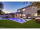 Resort style backyard showcases a pool, spa, and outdoor lounging area at 3641 E Los Gatos Dr, Phoenix, AZ 85050
