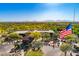 Elevated community features beautiful desert landscape, a clubhouse, and majestic mountain views in the background at 3641 E Los Gatos Dr, Phoenix, AZ 85050
