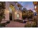 Inviting outdoor space with fire pit, comfortable seating, and string lights at 3641 E Los Gatos Dr, Phoenix, AZ 85050