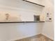 A spacious walk-in closet with white shelving and two clothes bars provide ample storage space at 36525 W Maddaloni Ave, Maricopa, AZ 85138