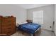 Bedroom featuring neutral walls and carpet, along with horizontal blinds at 3711 E Long Lake Rd, Phoenix, AZ 85048