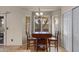 Bright breakfast nook with tile floors, a wood table, and natural light at 3711 E Long Lake Rd, Phoenix, AZ 85048