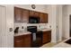 Well-lit kitchen featuring granite counters, tiled floors, and modern appliances at 3711 E Long Lake Rd, Phoenix, AZ 85048
