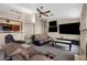 Spacious living room with carpeting, neutral paint, ceiling fan and comfortable seating at 3711 E Long Lake Rd, Phoenix, AZ 85048