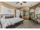 Comfortable bedroom featuring neutral walls and a modern metal-frame bed at 3754 E Flintlock Dr, Queen Creek, AZ 85142