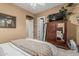 Bedroom featuring closet space, a ceiling fan, and a TV at 3754 E Flintlock Dr, Queen Creek, AZ 85142