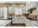 Well-appointed kitchen with granite countertops, stainless steel appliances, and modern fixtures at 3754 E Flintlock Dr, Queen Creek, AZ 85142