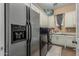 Functional laundry room with ample cabinet space and modern appliances at 3754 E Flintlock Dr, Queen Creek, AZ 85142
