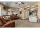 Open-concept living room with views into the kitchen and a stylish front entry at 3754 E Flintlock Dr, Queen Creek, AZ 85142