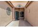 Welcoming entryway showcasing decorative ironwork and a charming front door at 411 N Cordoba Pl, Chandler, AZ 85226
