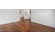 Neutral interior showcasing wood floors with access to multiple rooms and areas at 411 N Cordoba Pl, Chandler, AZ 85226