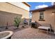 Backyard featuring a brick patio with a built in grill and patio furniture at 4156 E Jesse St, Gilbert, AZ 85295