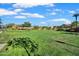Large community park with green grass, trees, walking paths, and a gazebo for outdoor enjoyment at 4156 E Jesse St, Gilbert, AZ 85295