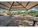 Community picnic area featuring covered tables, benches, and scenic views of surrounding greenery at 4156 E Jesse St, Gilbert, AZ 85295