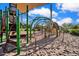 Community playground with climbing structures, slides, and a sand-filled play area at 4156 E Jesse St, Gilbert, AZ 85295