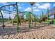Community playground with climbing structures and a soft, sandy landing surface at 4156 E Jesse St, Gilbert, AZ 85295