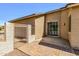 Paver patio with gated side yard access, perfect for outdoor gatherings and enhanced privacy at 41769 W Canasta Ln, Maricopa, AZ 85138