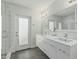 Bright bathroom with double sink vanity and glass shower at 4317 E Yucca St, Phoenix, AZ 85028