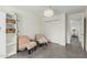 Bedroom with 2 accent chairs, tile floors, and a closet at 4317 E Yucca St, Phoenix, AZ 85028